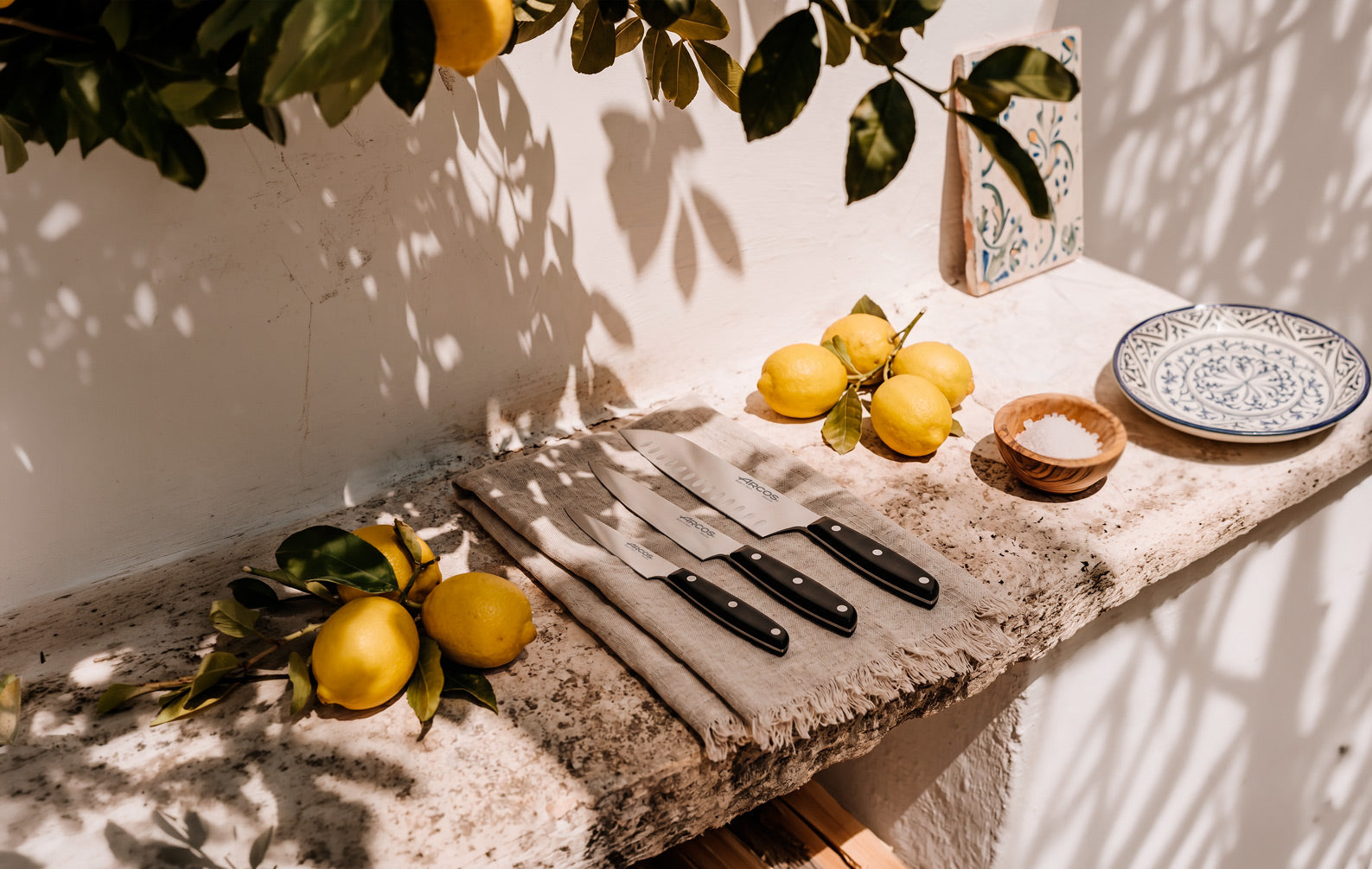 ARCOS knife block alongside kitchen utensils